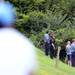 Emergency personnel watches from a hill as a body is removed from Ford Lake. Melanie Maxwell | AnnArbor.com 